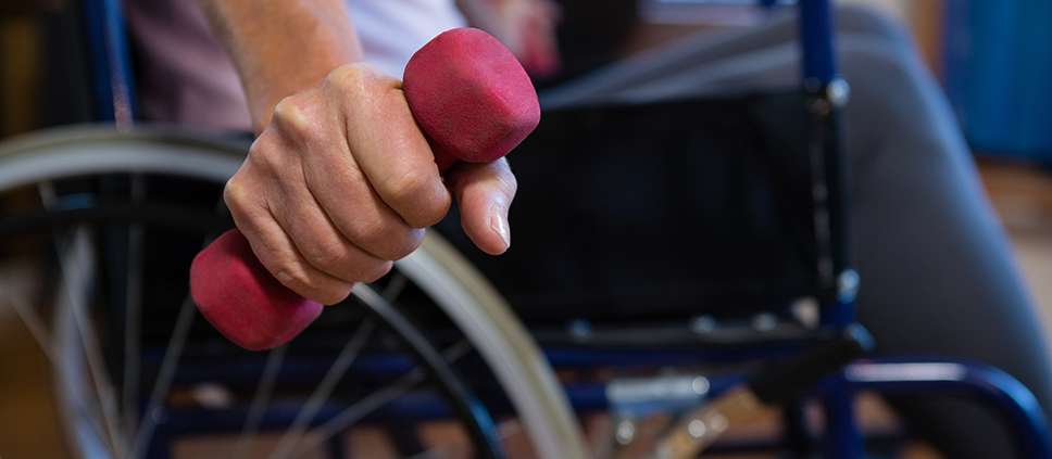 iStock 837816348 exercise weights dumbell wheelchair fitness c